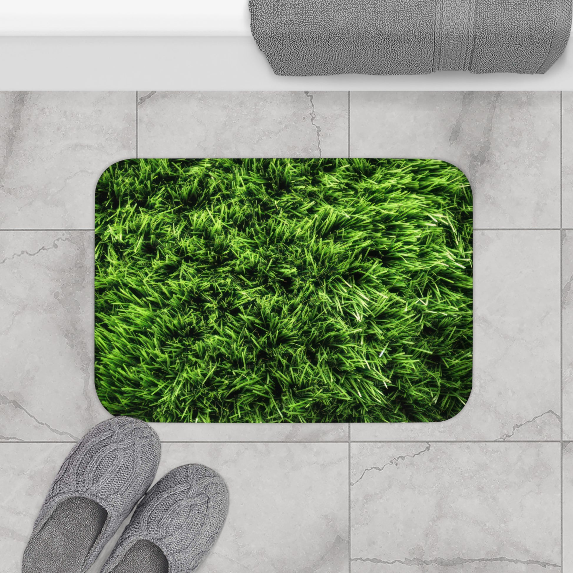 Elevate your bathroom with the freshness of nature using Walking on Grass - Decor Bath Mat. The captivating grass graphic, crafted from durable 100% microfiber, infuses your bathroom with a lush, green ambiance. Its anti-slip backside ensures stability, while the detailed binding around the edges ensures long-lasting quality.